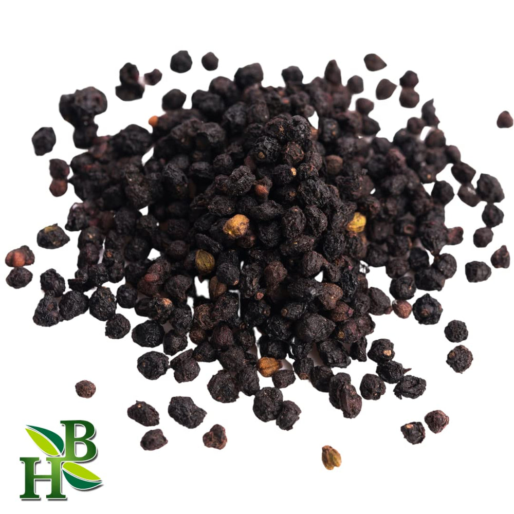 Herb To Body elderberry tea or syrup preparation on kitchen counter