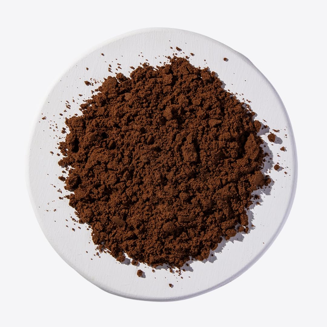 Herb To Body powder texture close-up for precise dosing.