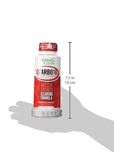 Herbal Clean Qcarbo16 tropical bottle with snacks nearby during cleanse.