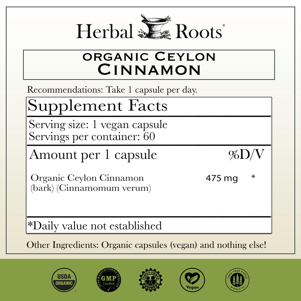 Close-up of Herbal Roots Cinnamon capsules highlighting vegan, pure daily wellness.