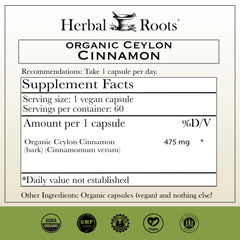 Close-up of Herbal Roots Cinnamon capsules highlighting vegan, pure daily wellness.