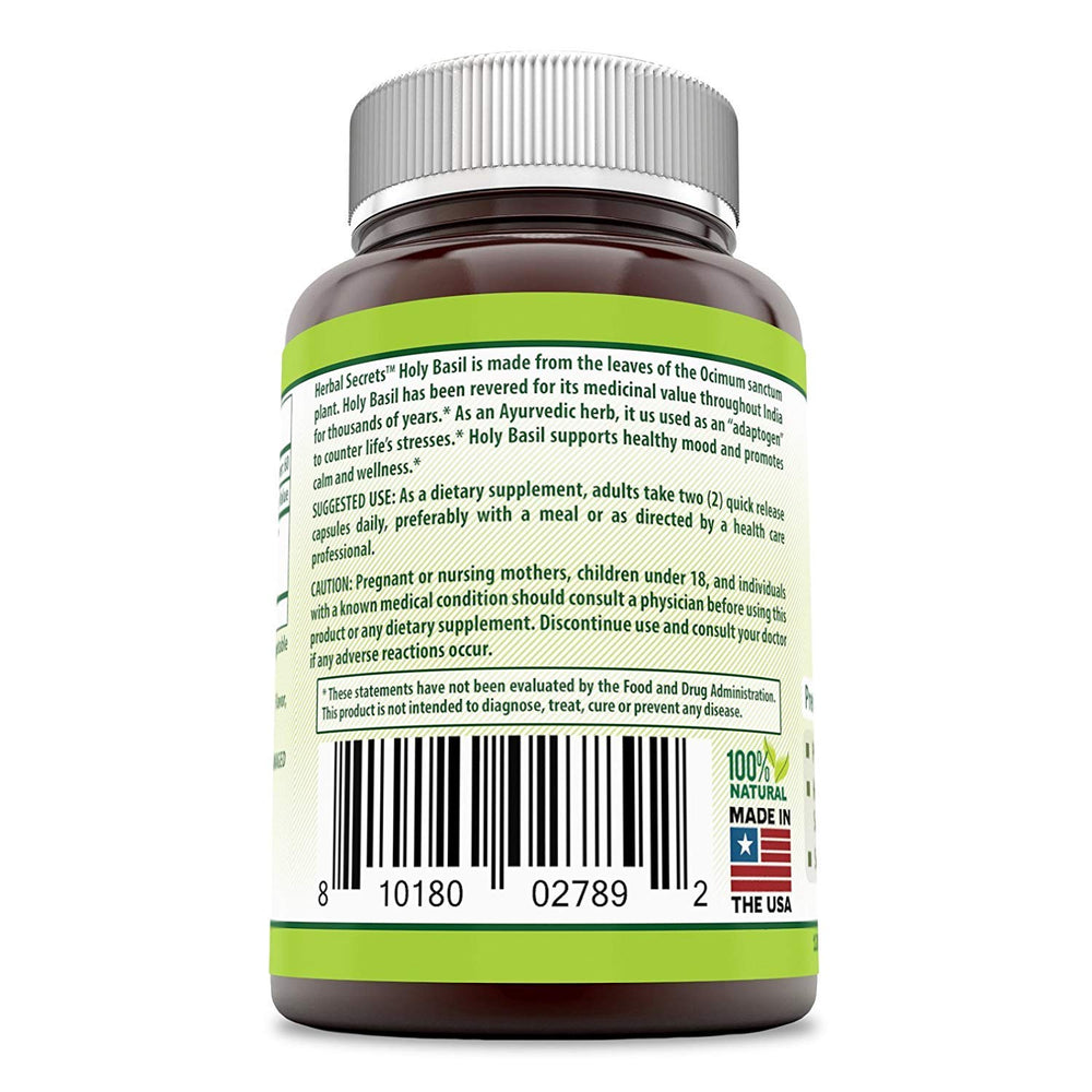 Label closeup highlighting pure holy basil leaf extract quality.