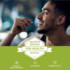 HERBALY Wellness oregano oil capsules bottle with label highlighting quality and wildcrafted origin.