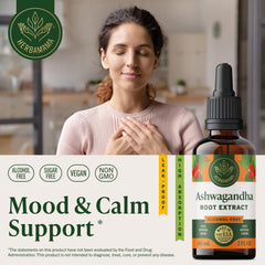 HERBAMAMA Ashwagandha Drops dropper dispensing into a glass for easy use.