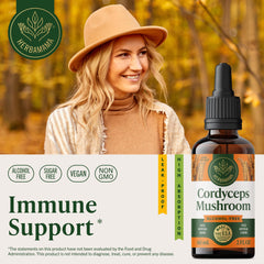 Dropper releasing HERBAMAMA Cordyceps tincture into a glass for easy daily use.