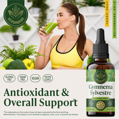 HERBAMAMA Gymnema Sylvestre Drops poured into water for quick antioxidant support.