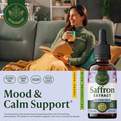 HERBAMAMA saffron tincture pours into glass for easy integration into drinks.