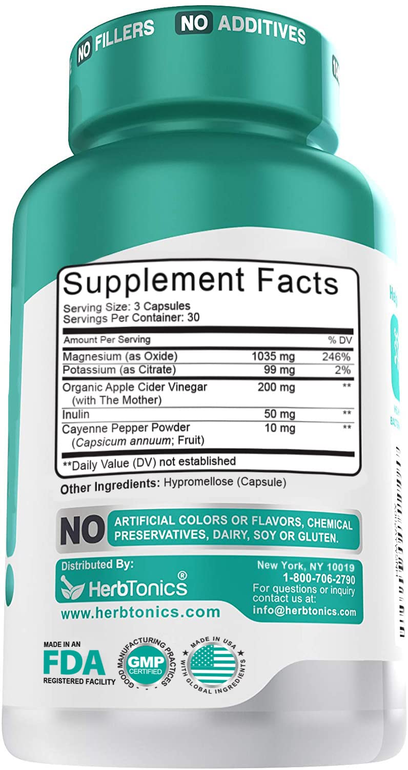 Herbtonics capsules in close-up highlighting gluten-free and dairy-free daily gut support