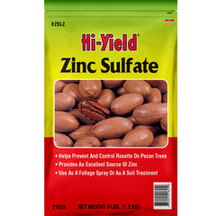 Hi-Yield Zinc Sulfate bottle pour demonstrates ready-to-apply zinc source for pecan and fruit tree health.