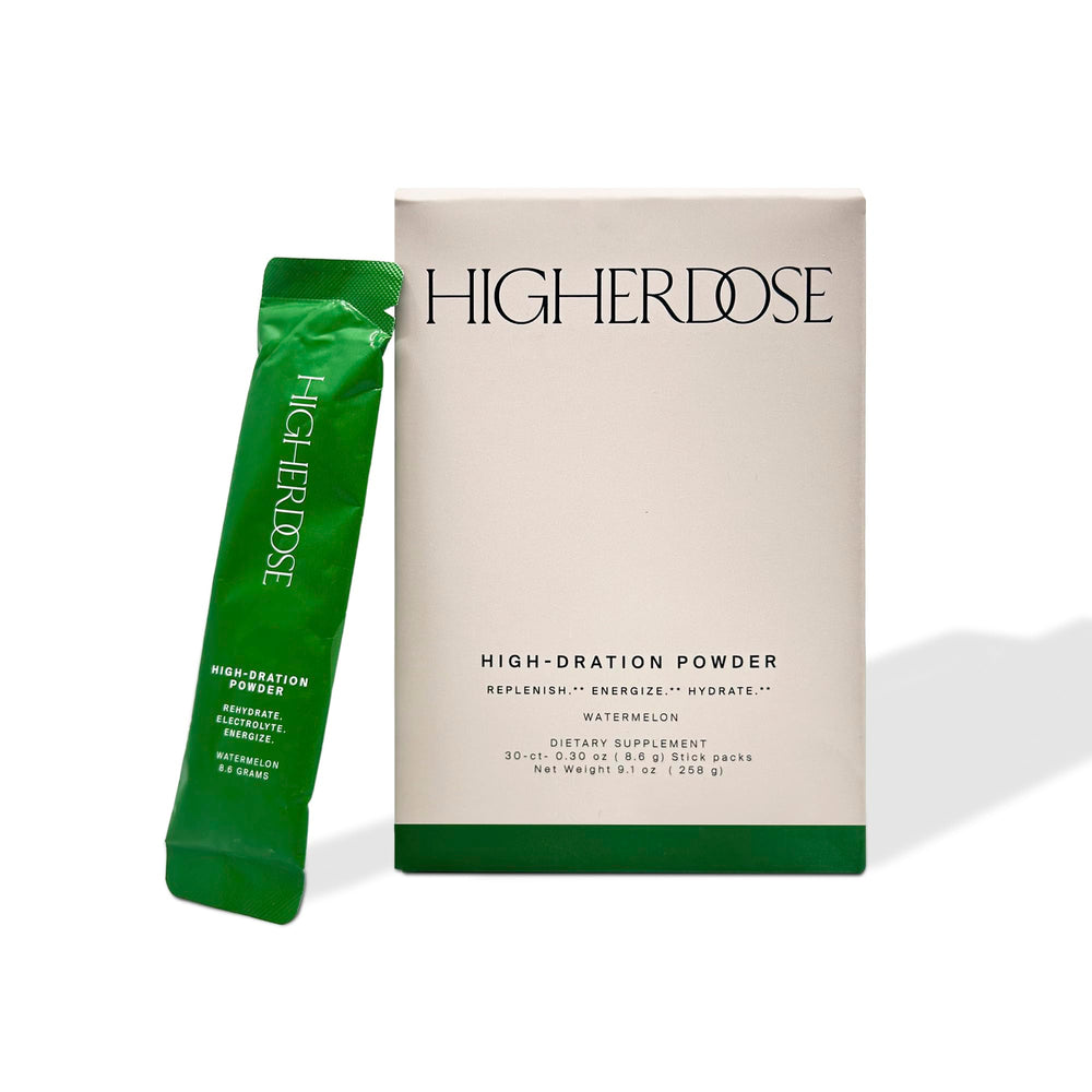 HigherDOSE High-Dration powder dissolving in water for post-workout hydration.