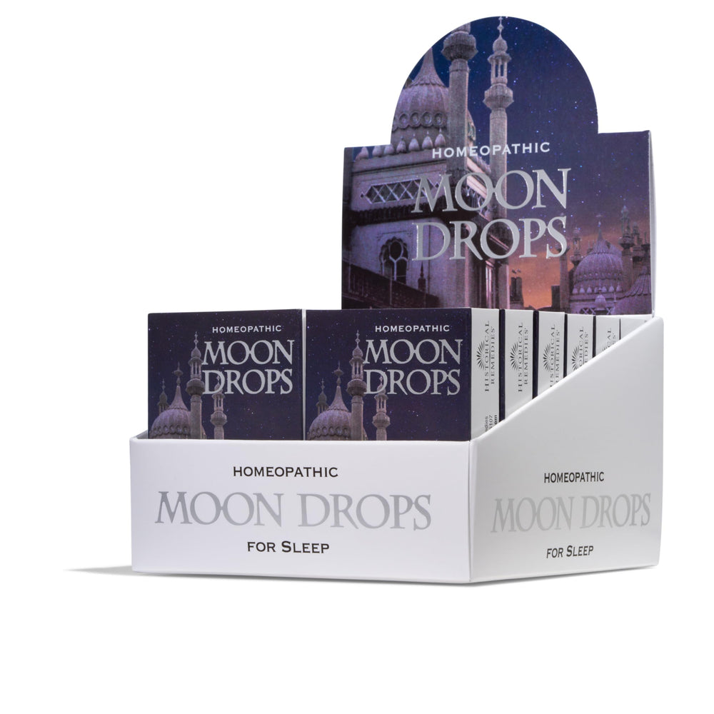 Historical Remedies Moon Drops bottle with vanilla lozenges for calm, non-drowsy sleep support.