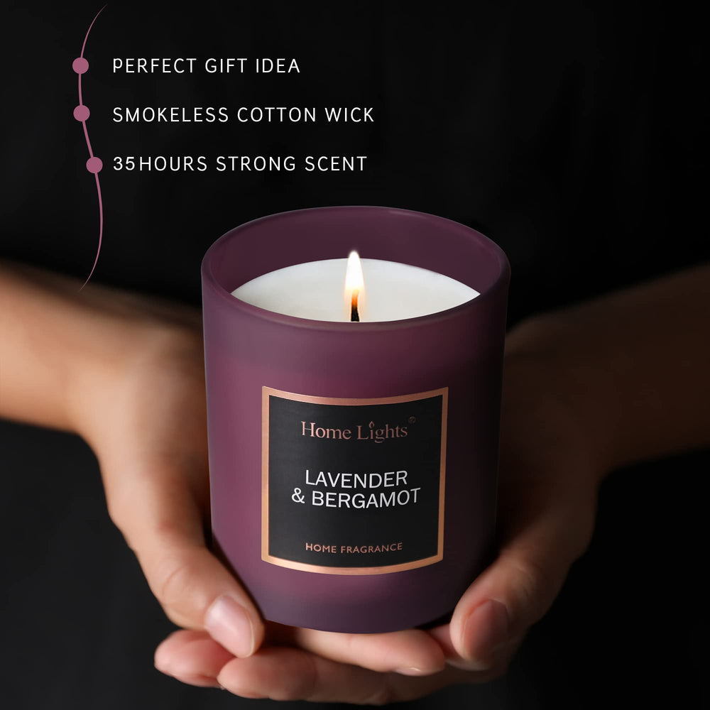 Home Lights soy candle in clear glass jar, stylish decor.