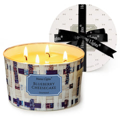 Home Lights Blueberry Cheesecake 4-Wick Candle in a stylish jar for cozy evenings.