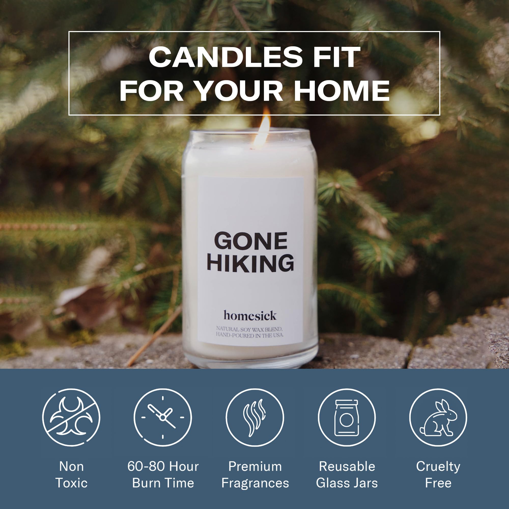 Homesick Gone Hiking candle in room scene evokes outdoor retreat.