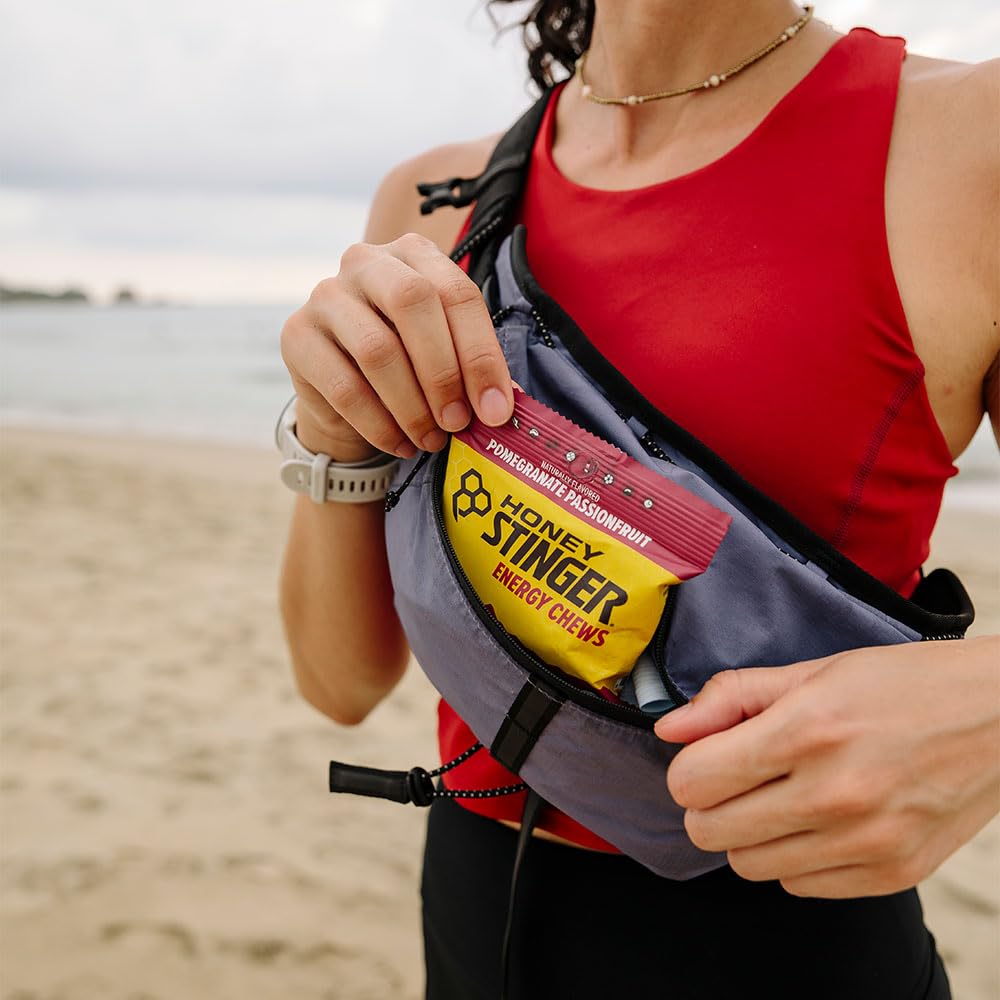 Honey Stinger Organic Pomegranate Passionfruit Chew in a sports bag for training