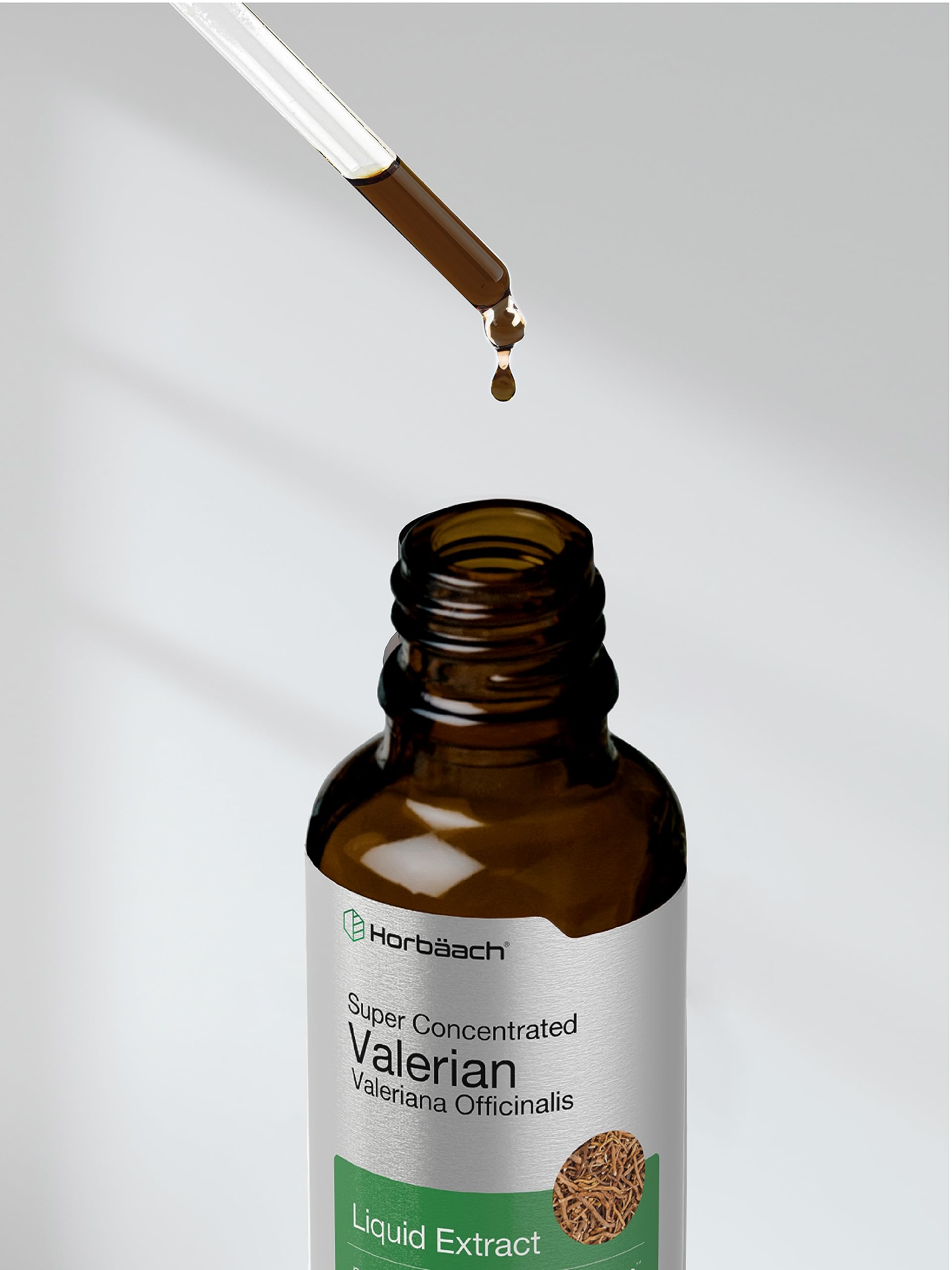 Horbaach Valerian Root Drops bottle in serene night scene conveys calm.