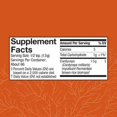 Cordyceps powder scoop beside jar for easy serving