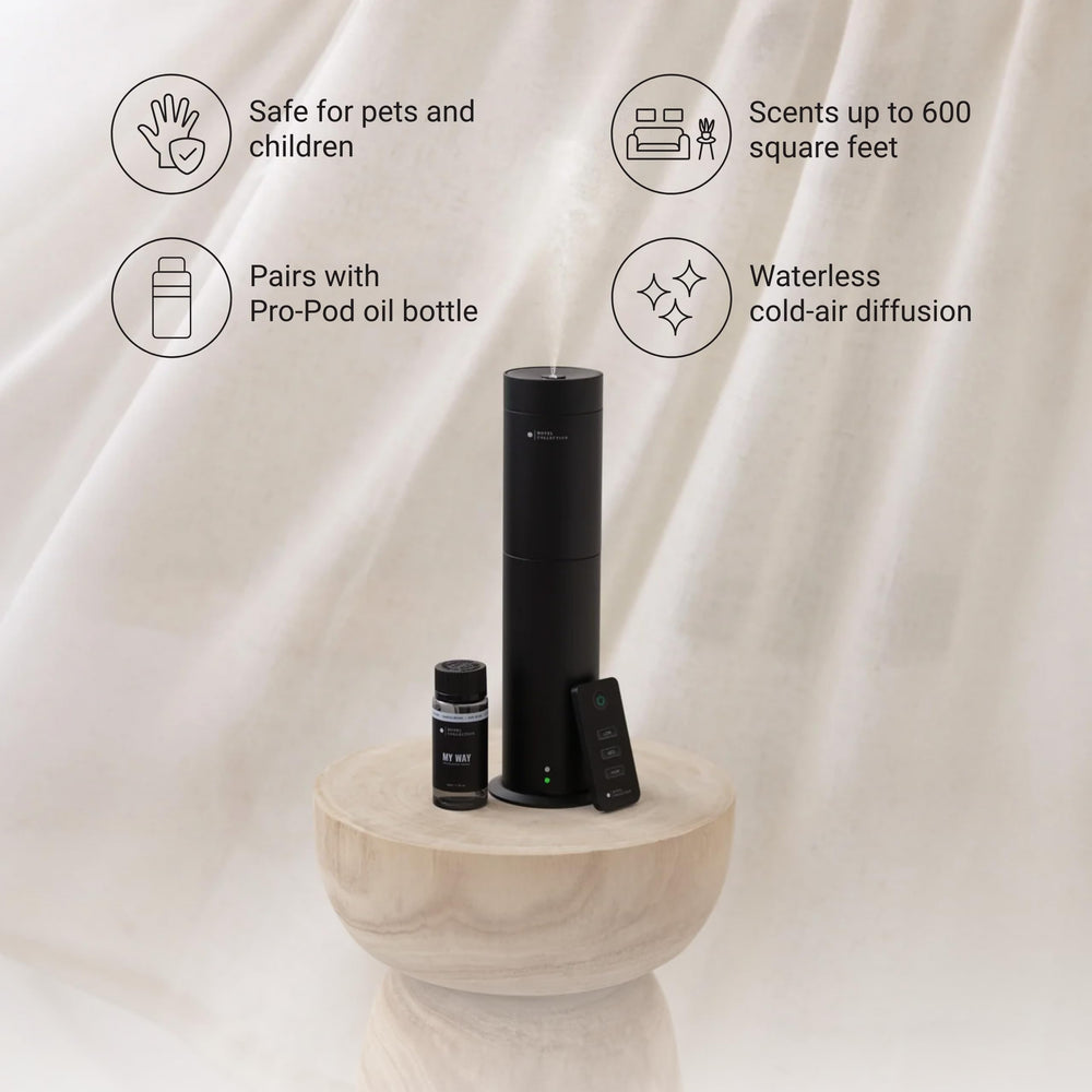 Hotel Collection Studio Pro diffuser with remote control for easy fragrance management.