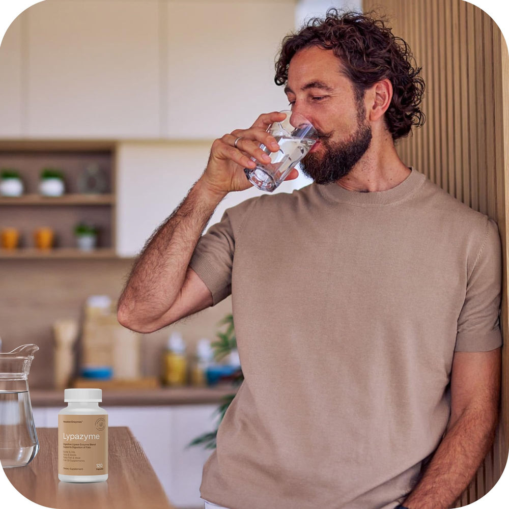 Houston Enzymes Lypazyme bottle on table for everyday fat digestion support.