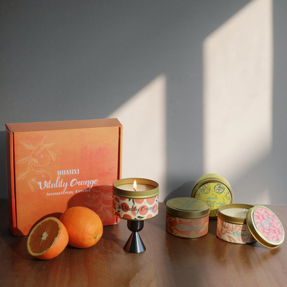 HUAN XI jar closeup shows sturdy travel tins for on-the-go fragrance.