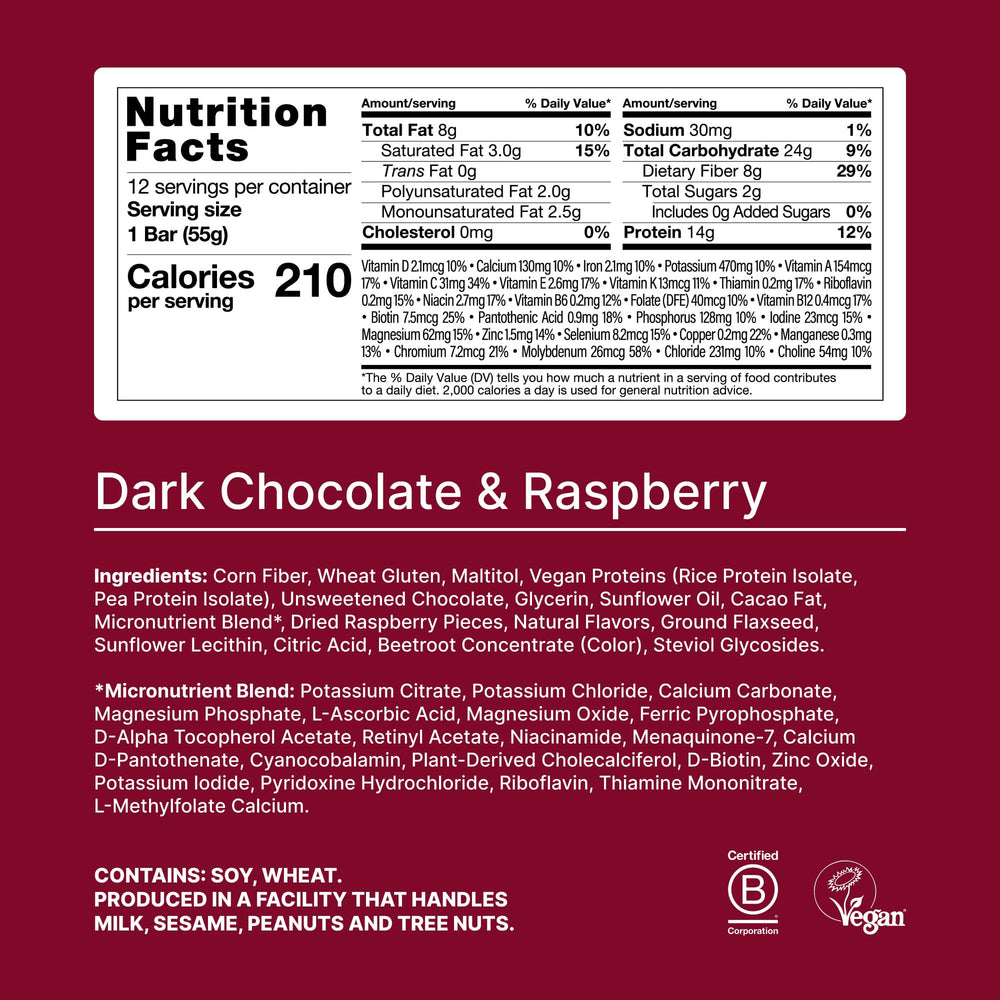 Huel bar cross-section reveals caramel layer and vegan coating for a tasty texture.