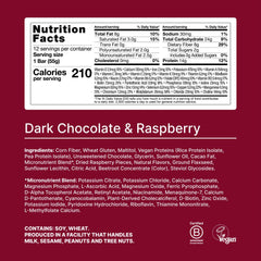 Huel bar cross-section reveals caramel layer and vegan coating for a tasty texture.