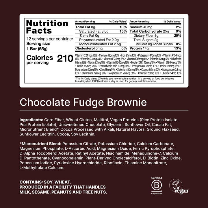 Huel fudge brownie bar broken open for a high-protein, fiber-rich bite