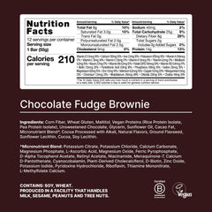 Huel fudge brownie bar broken open for a high-protein, fiber-rich bite
