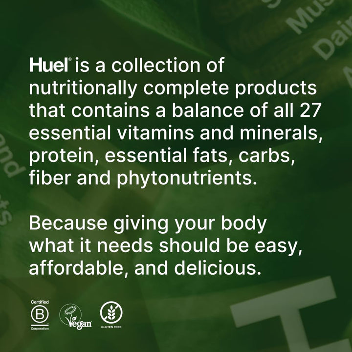Huel Daily Greens ingredient scene, colorful botanicals and superfoods.