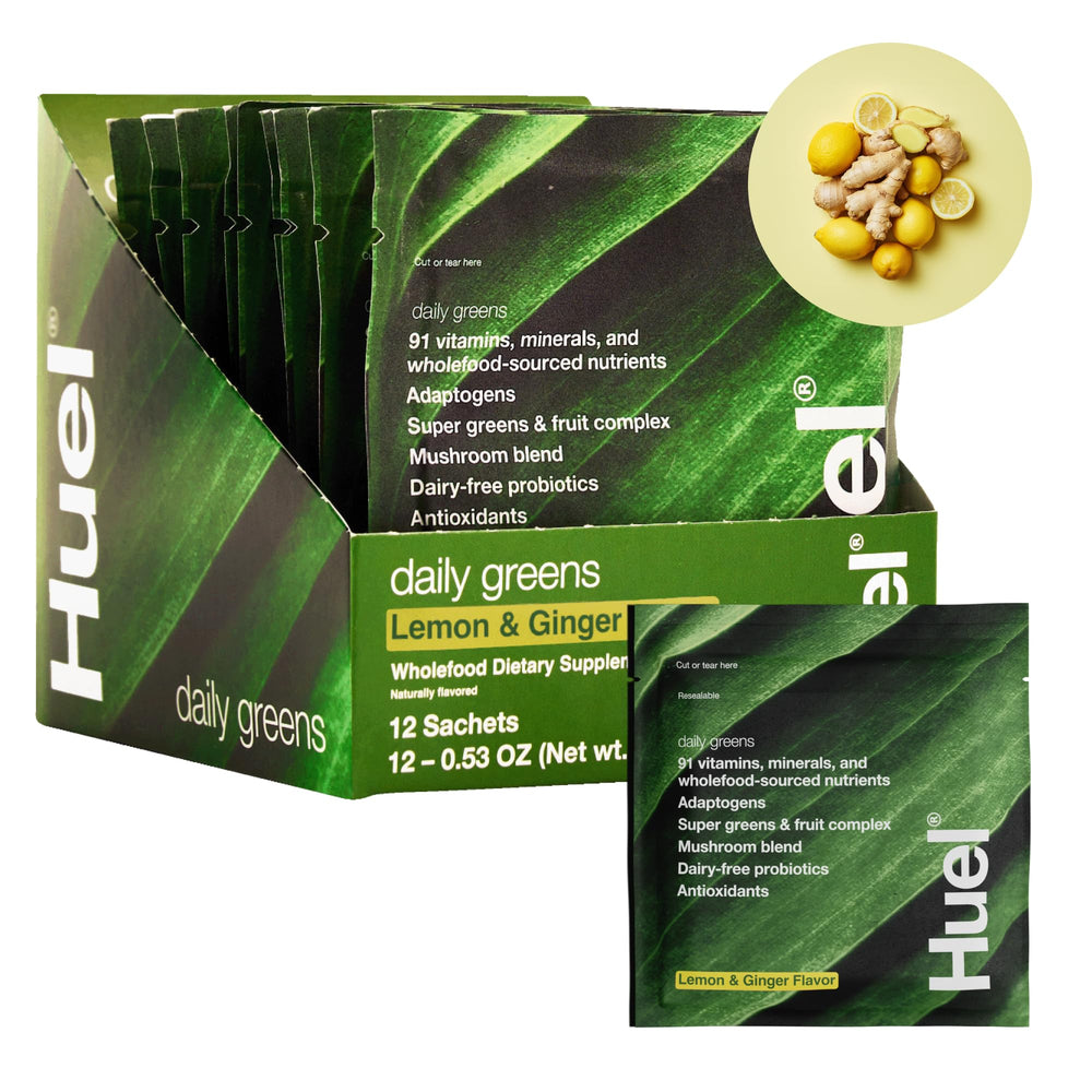 Huel Daily Greens lemon-ginger tub showing a convenient daily nutrient boost