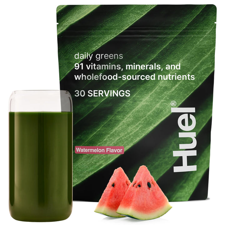 Huel Daily Greens Watermelon taste in glass, a refreshing morning hydration.