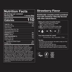 Huel Vegan Protein Strawberry shake being prepared in glass.