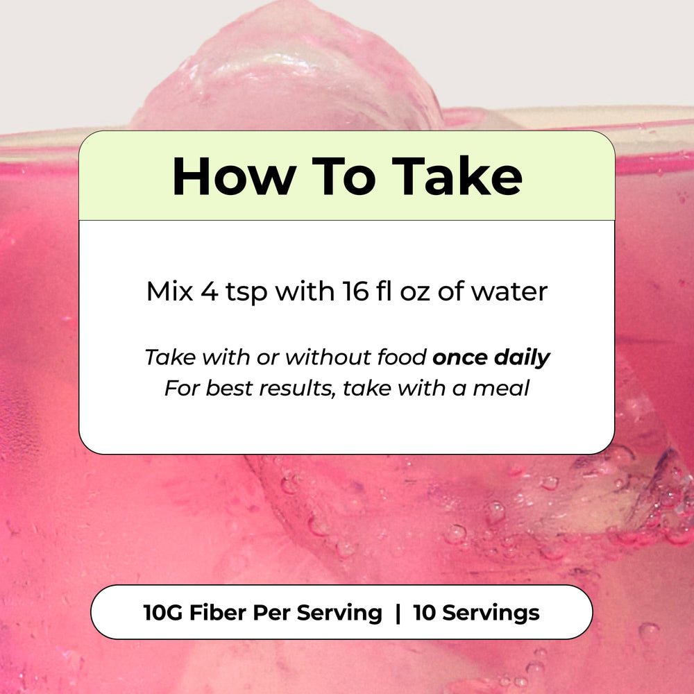 HUM Flatter Me glass with drink showcases refreshing strawberry lemon flavor.