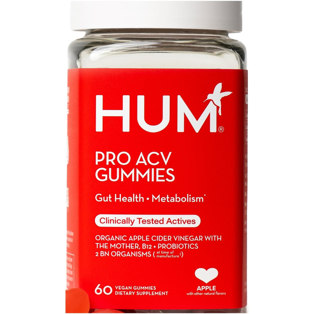 HUM Pro ACV Gummies bottle on a kitchen counter for convenient daily digestive support.