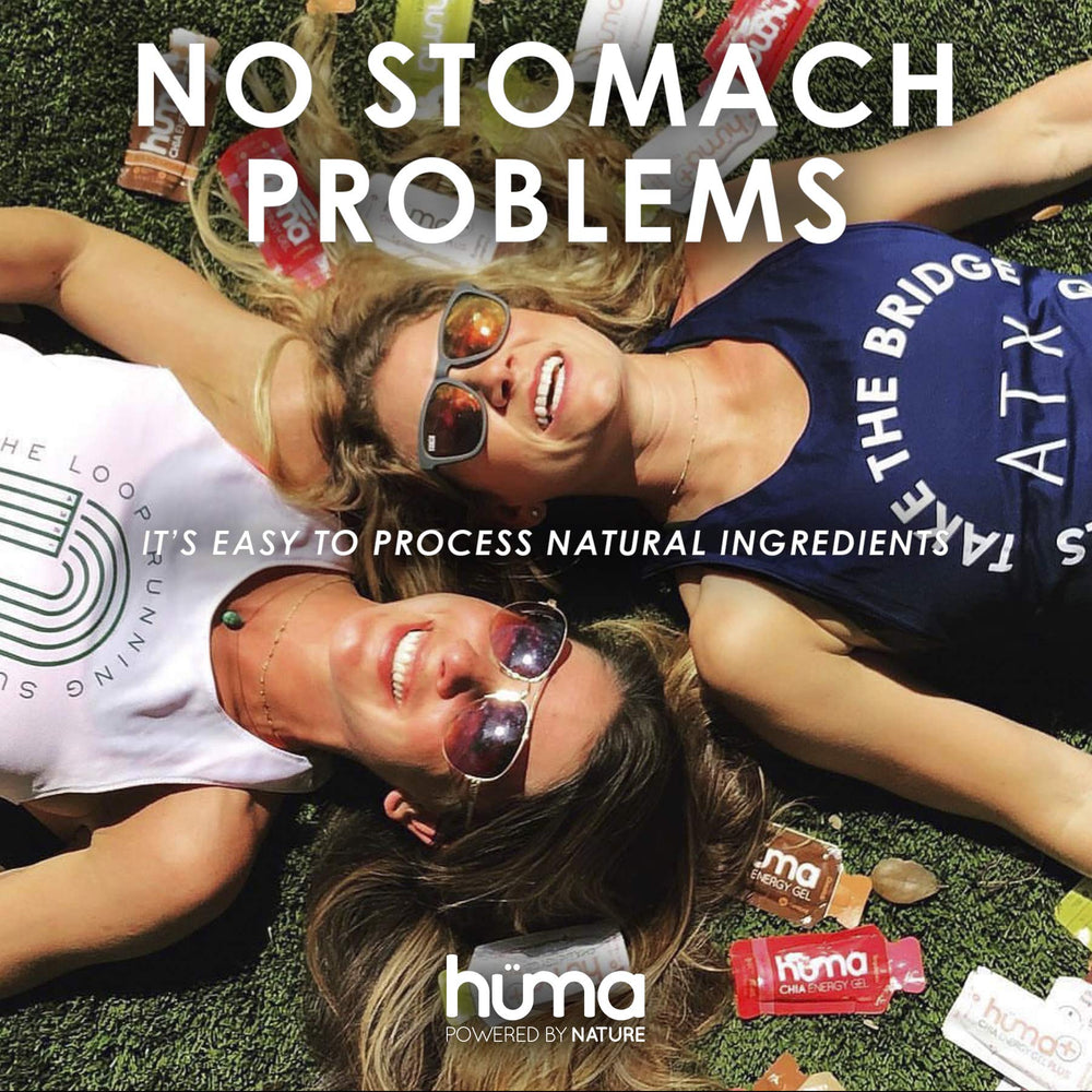 Runner using HÜMA Chia Energy Gel Lemonade for quick carbs mid-run.