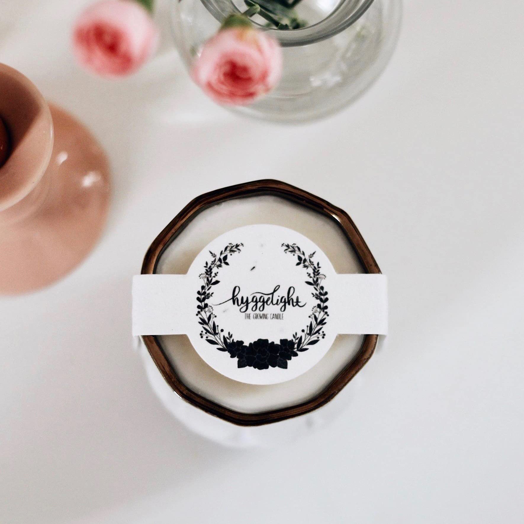 Hyggelight Astrid 9oz candle scent in a ceramic pot