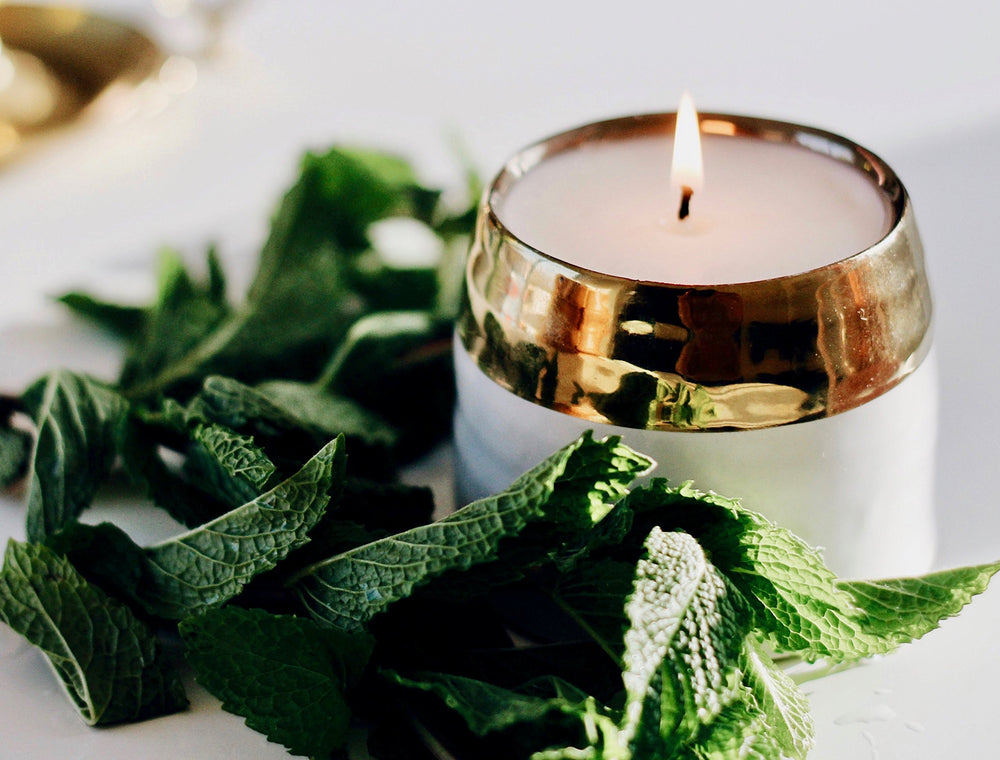 Hyggelight Clara gold and white ceramic container design.