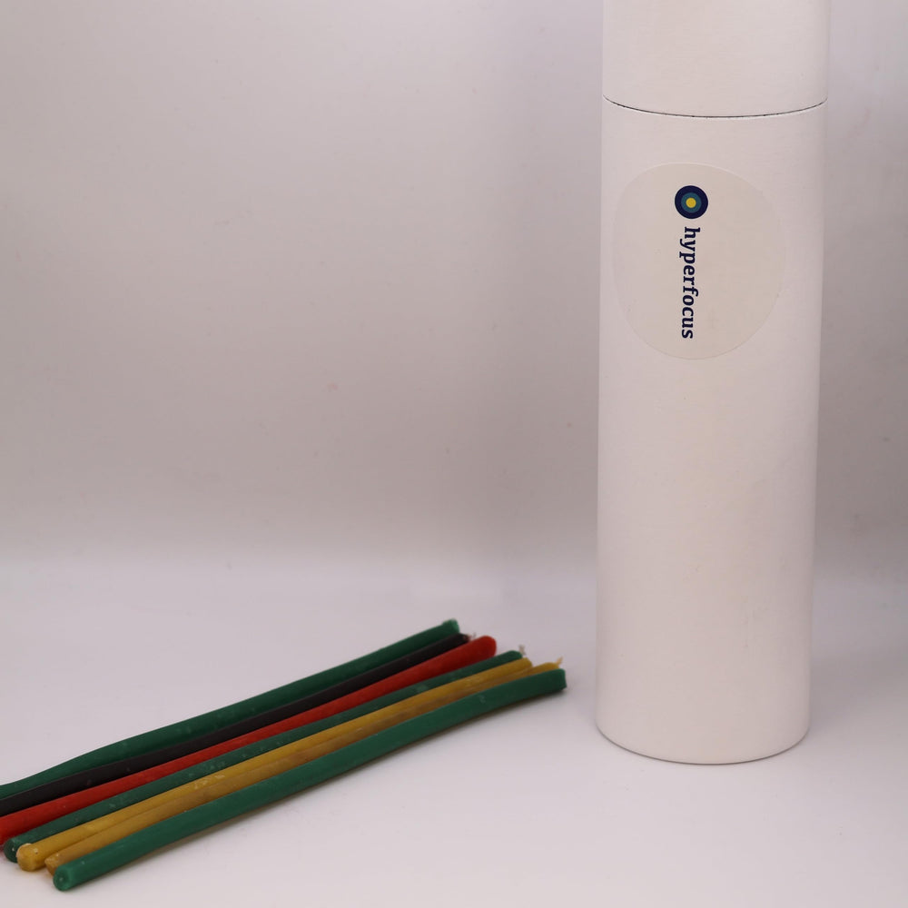 HyperFocus Taper Candles green wax variant creates tranquil ambiance for meetings.