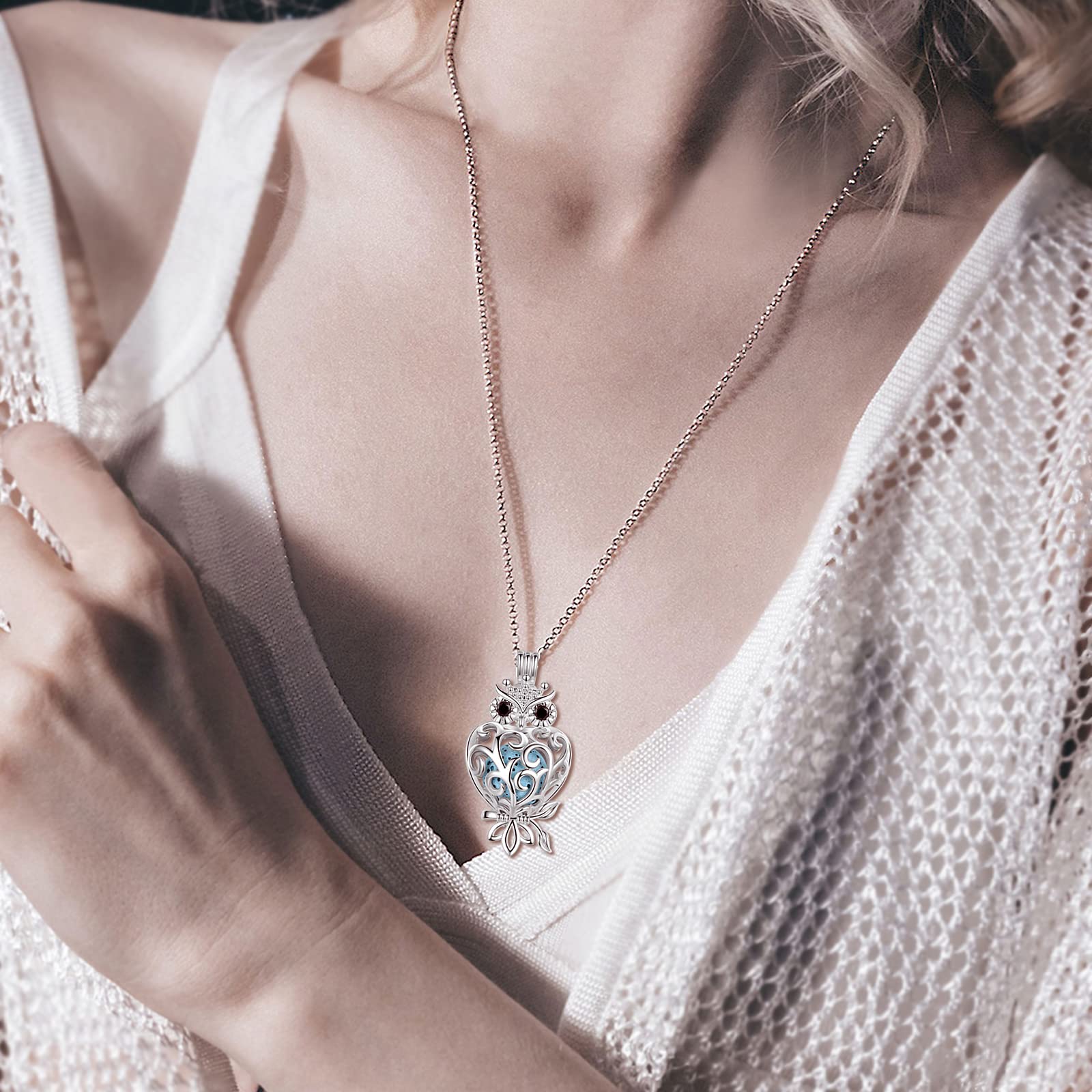 INFUSEU Owl pendant in velvet bag—gift-ready packaging