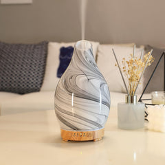 Inrorans art glass diffuser upper for elegant room ambience and aromatherapy.
