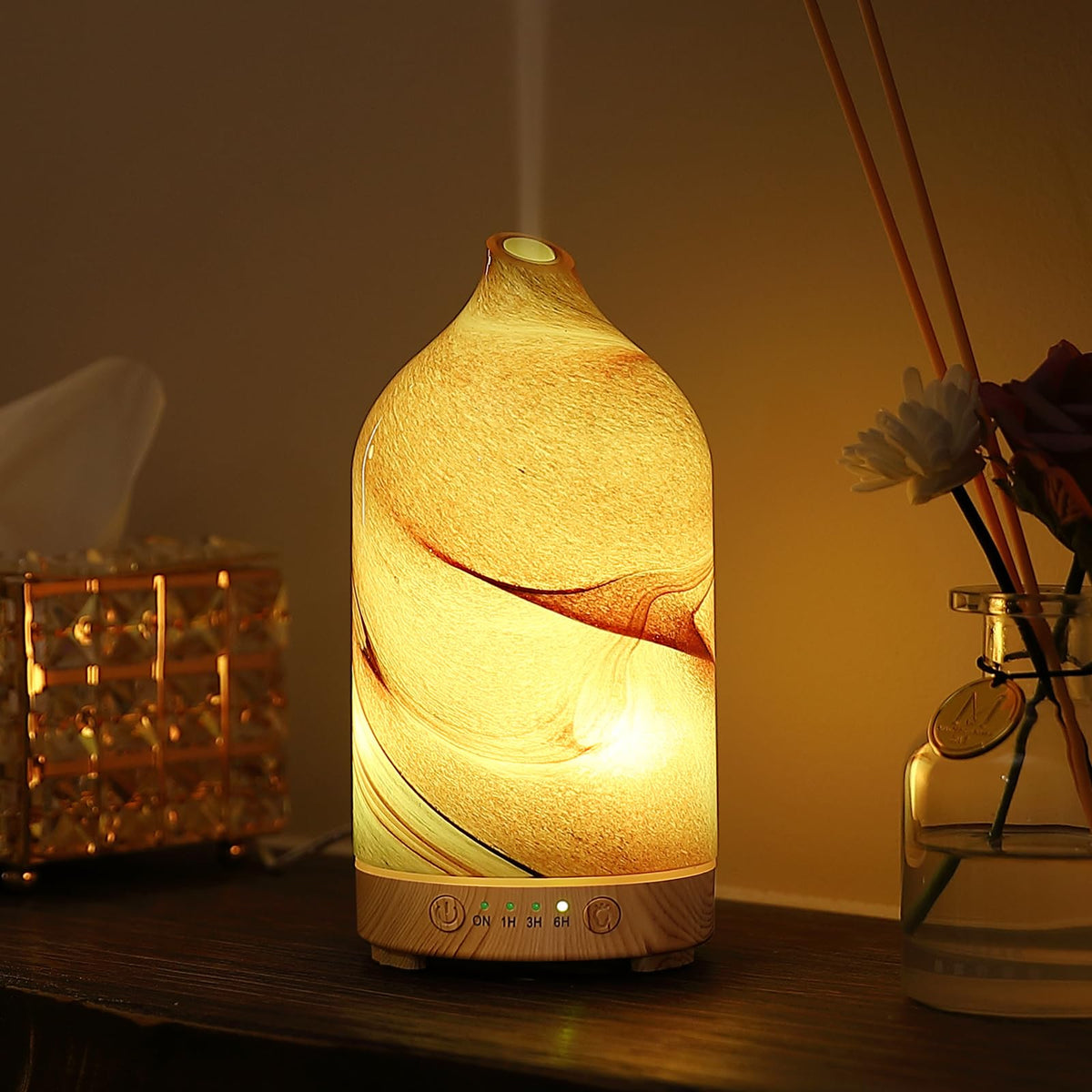 Inrorans hand-blown glass diffuser adds artistic flair for home aromatherapy.
