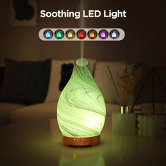 Inrorans diffuser with wood-grain base for stable placement in cozy spaces.