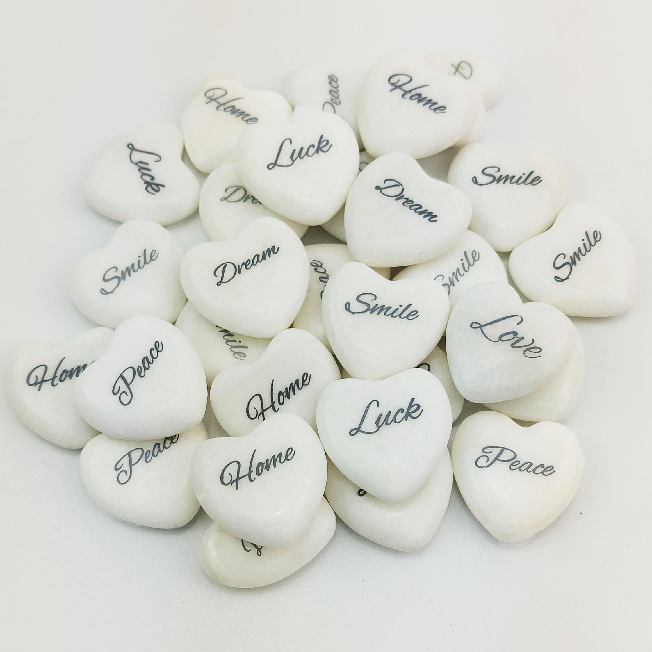 inspirational heart stones in a gift box offering uplifting messages
