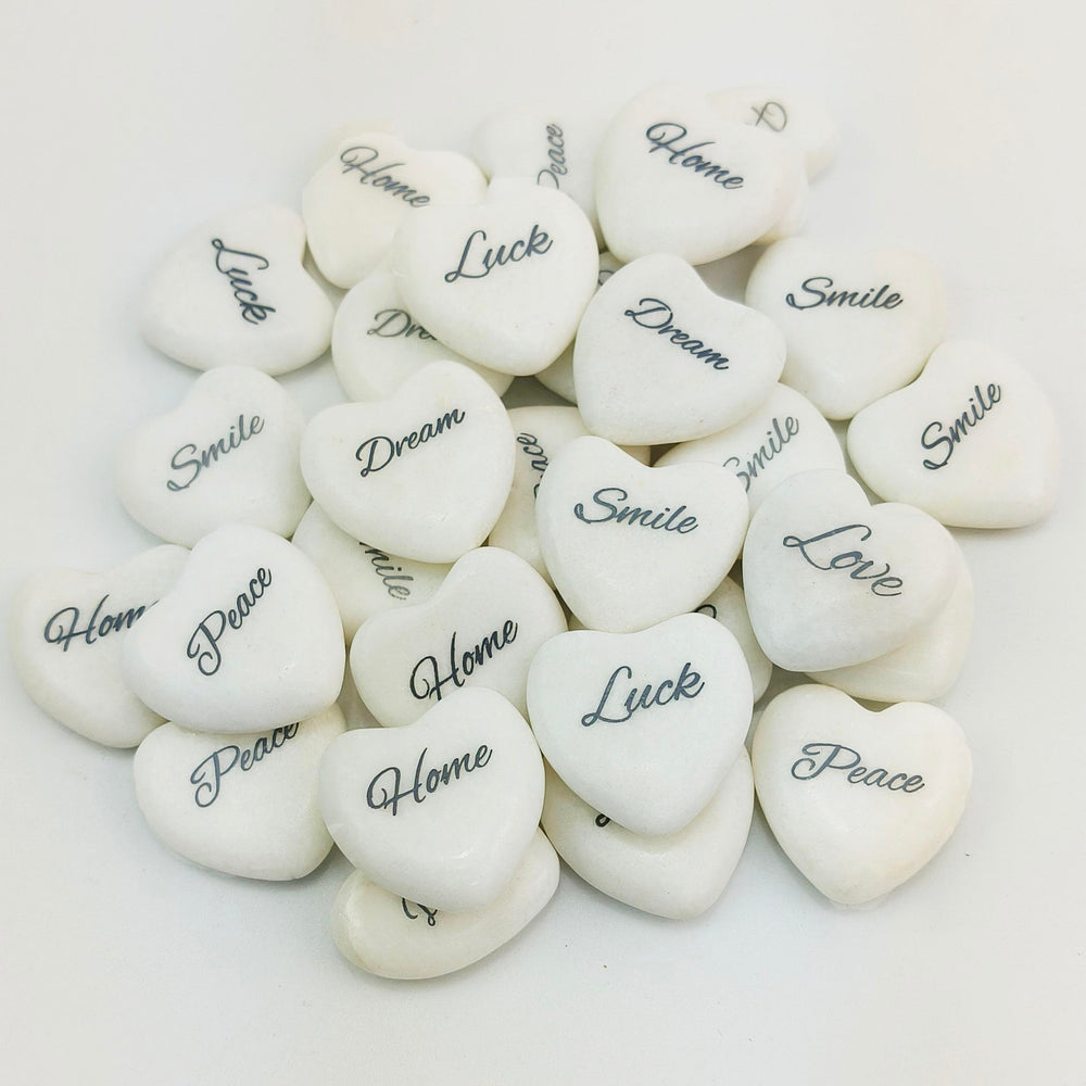 inspirational heart stones in a gift box offering uplifting messages