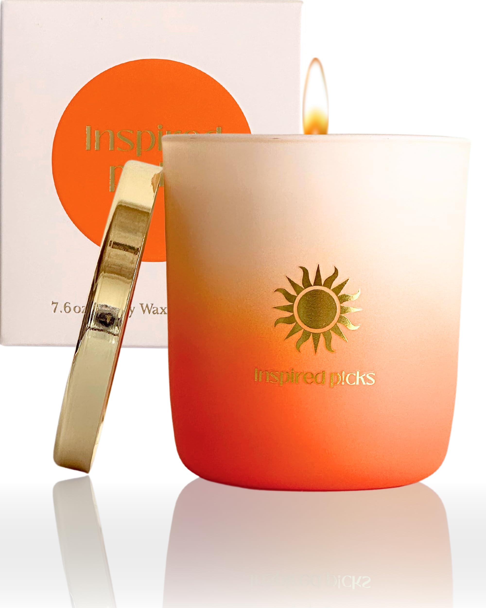 Inspired Picks Orange Candle bergamot-rosewood scent creates warm ambiance.
