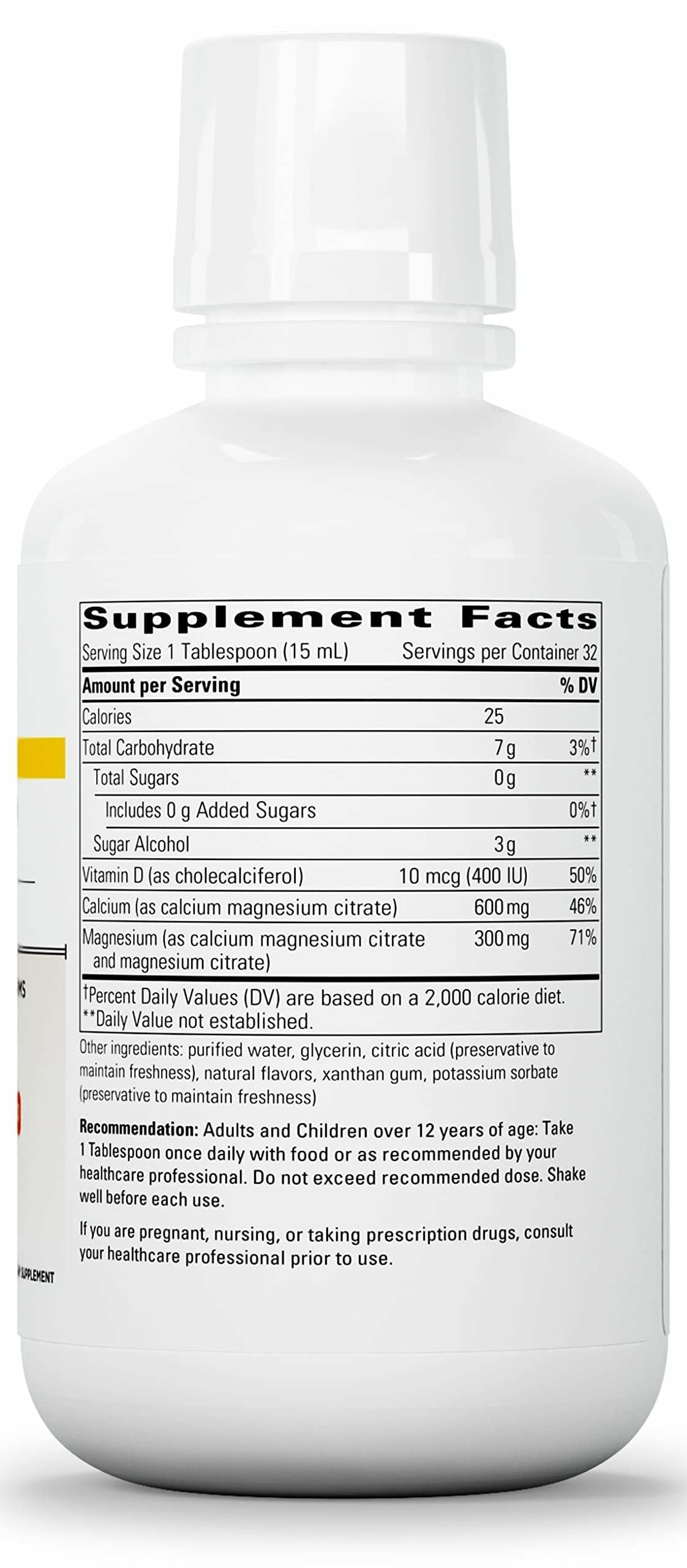 Pouring 15 ml daily dose of Integrative Therapeutics liquid calcium magnesium.