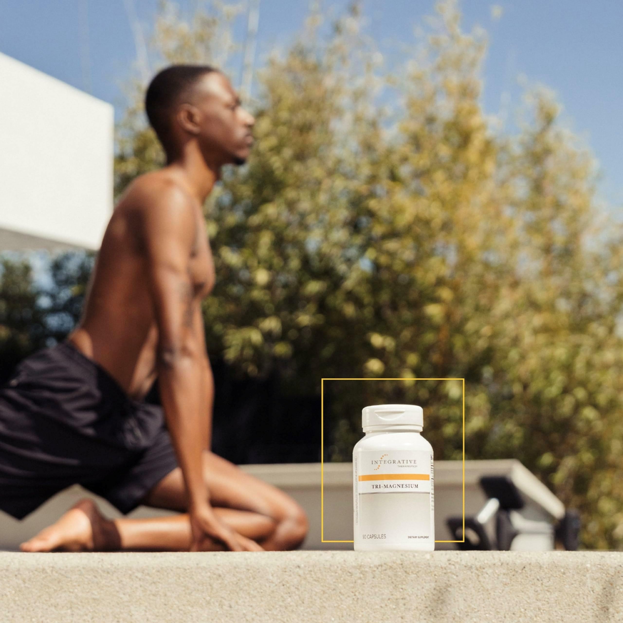 Person using Tri-Magnesium at a desk for focus and energy