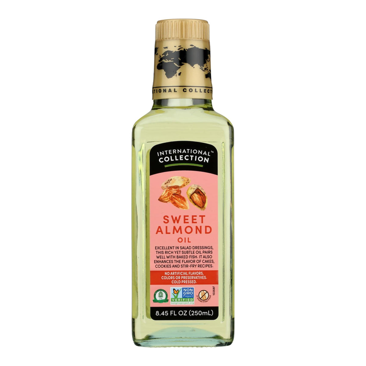 International Collection Almond Oil bottle pouring over salad for light, nutty flavor.