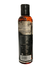 Intimate Earth Naked Massage Oil being poured for a relaxing massage