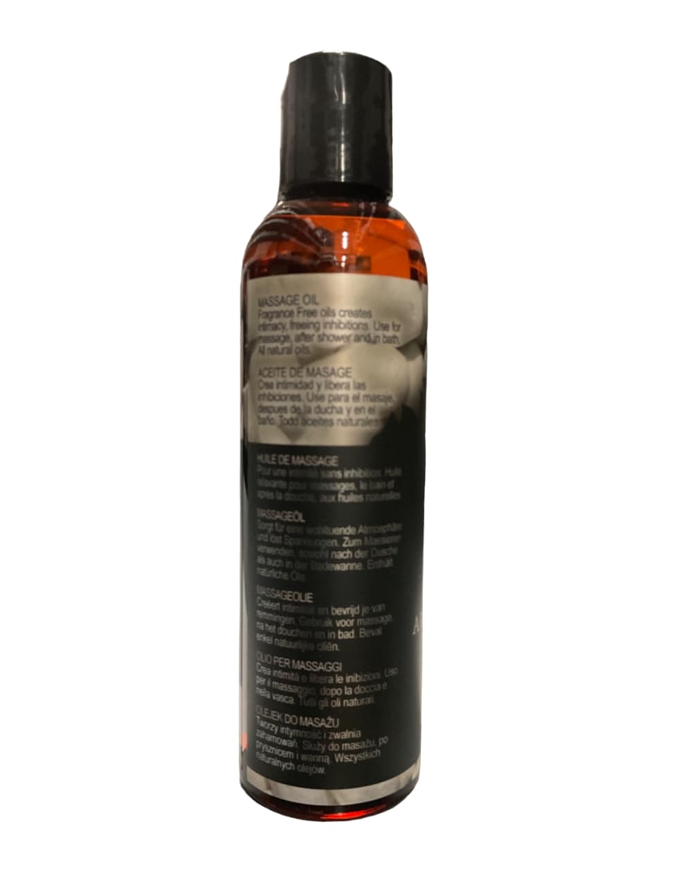 Intimate Earth Naked Massage Oil texture shown on skin during application